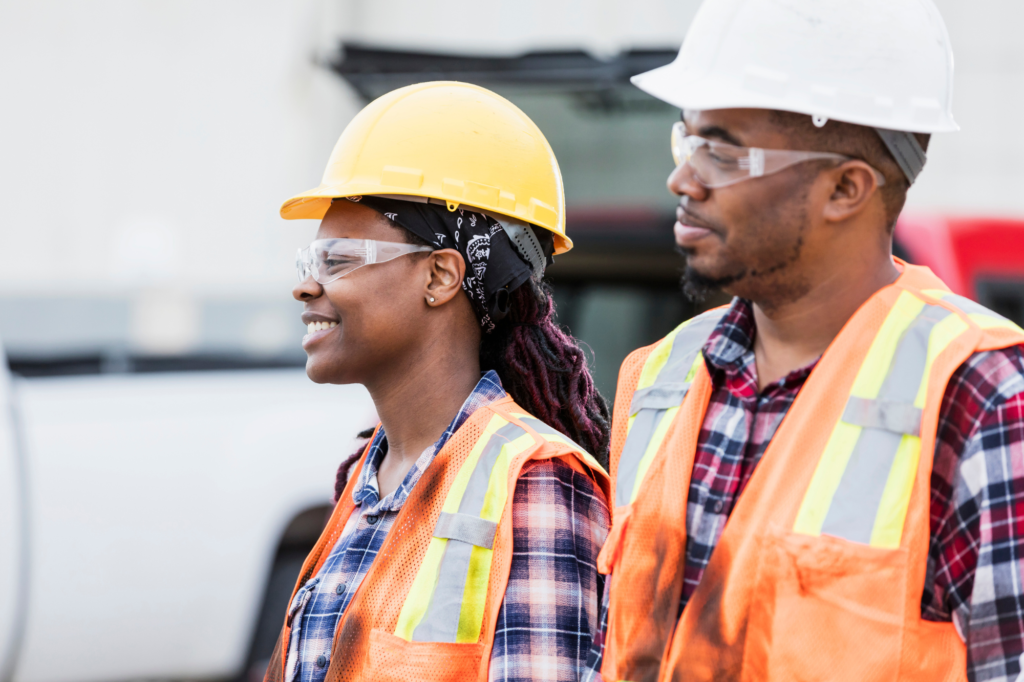 Male and female construction workers