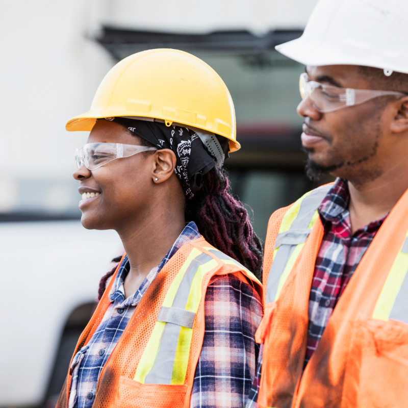 Male and female construction workers