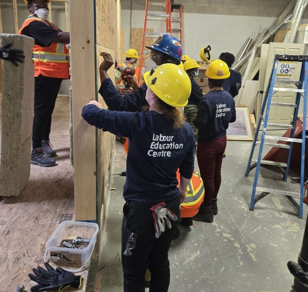 Women in Construction participants working on a construction project.